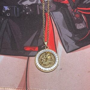 Gold and Silver Pendant Necklace